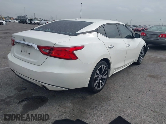 2016 Nissan Maxima SL with VIN 1N4AA6AP3GC448957, listed as a IAAI auction lot 41734717 with 128,687 mi miles and . Bid and sale history available at DreamBid. Image 4.