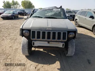 1998 Jeep Grand Cherokee Limited with VIN 1J4GZ78Y2WC146974, listed as a Copart auction lot 71435484 with 192,996 mi miles and Salvage Title. Bid and sale history available at carsss.com. Image 5.