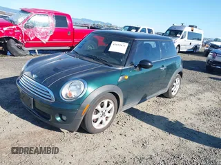 2008 MINI Hardtop with VIN WMWMF33518TT64881, listed as a IAAI auction lot 41692875 with 152,380 mi miles and . Bid and sale history available at DreamBid. Image 2.