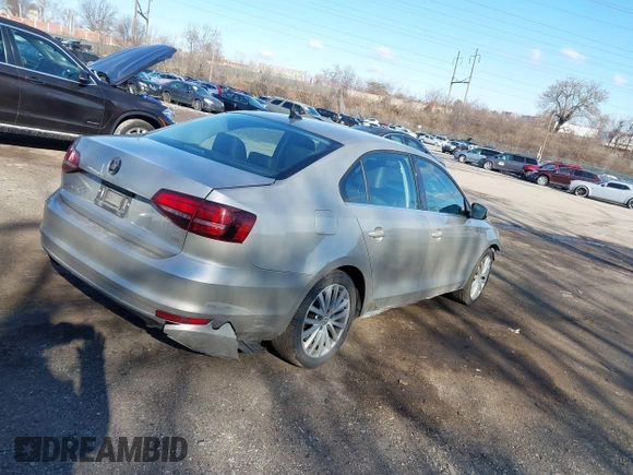 2016 Volkswagen Jetta Sedan 1.8T SEL with VIN 3VWL07AJ0GM313695, listed as a IAAI auction lot 41523515 with 94,212 mi miles. Bid and sale history available at carsss.com. Image 4.