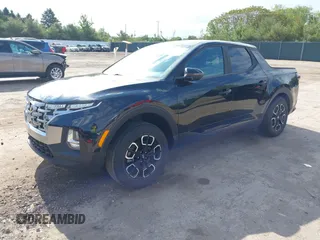 2022 Hyundai Santa Cruz SEL with VIN 5NTJBDAE2NH000464, listed as a IAAI auction lot 42329921 with 32,890 mi miles and . Bid and sale history available at DreamBid. Image 17.