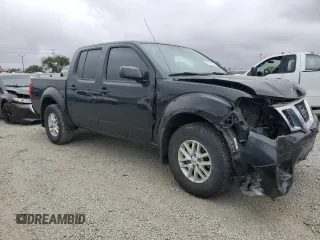 2019 Nissan Frontier SV with VIN 1N6AD0EV3KN764084, listed as a Copart auction lot 59191595 with 51,276 mi miles and Salvage title. Bid and sale history available at DreamBid. Image 4.