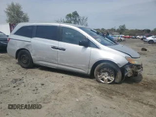 2013 Honda Odyssey LX z VIN 5FNRL5H28DB085114, wystawiony jako Copart lot #52942495 z przebiegiem 158 191 mil mil oraz Szkoda całkowita • Salvage title. Historia ofert i sprzedaży dostępna na DreamBid. Obrazek 4.