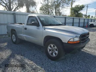2003 Dodge Dakota with VIN 1D7FL16X23S122093, listed as a Copart auction lot 87394974 with 264,510 mi miles and Salvage Title. Bid and sale history available at carsss.com. Image 4.