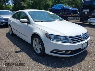 2014 Volkswagen CC R-Line with VIN WVWBP7AN7EE529169, listed as a IAAI auction lot 42534458 with 198,071 mi miles and . Bid and sale history available at DreamBid. Image 1.