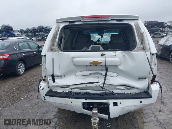 2014 Chevrolet Suburban LT with VIN 1GNSCJE06ER154639, listed as a IAAI auction lot 41410623 with 213,592 mi miles. Bid and sale history available at carsss.com. Image 16.