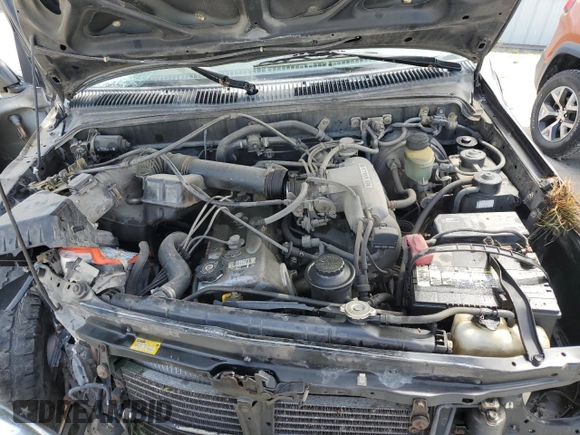 1996 Toyota Tacoma z VIN 4TAWM72N5TZ191278, wystawiony jako Copart lot #57338965 z przebiegiem 233 749 mil mil oraz Szkoda całkowita • Salvage title. Historia ofert i sprzedaży dostępna na DreamBid. Obrazek 11.