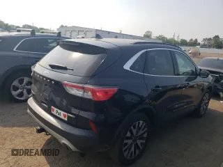 2020 Ford Escape Titanium z VIN 1FMCU9J97LUB25055, wystawiony jako Copart lot #60326945 z przebiegiem 78 711 mil mil oraz Szkoda całkowita • Salvage title. Historia ofert i sprzedaży dostępna na DreamBid. Obrazek 3.