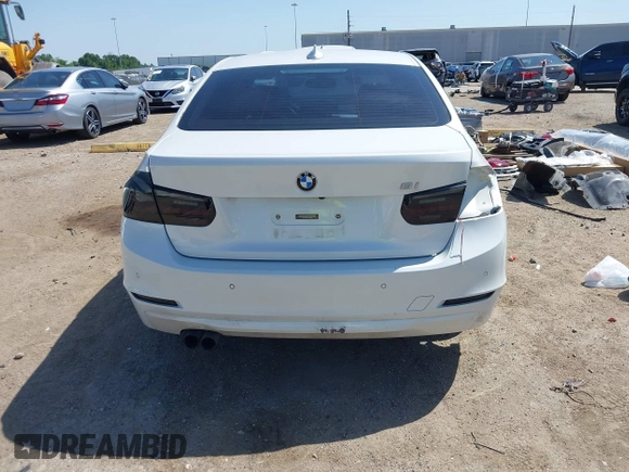 2012 BMW 3 Series 328i with VIN WBA3A5C51CF349987, listed as a IAAI auction lot 42013599 with 256,461 mi miles. Bid and sale history available at carsss.com. Image 16.