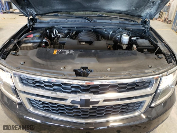 2019 Chevrolet Suburban LT with VIN 1GNSKHKC2KR299019, listed as a Copart auction lot 42623215 with 84,747 mi miles and Salvage Title. Bid and sale history available at carsss.com. Image 12.