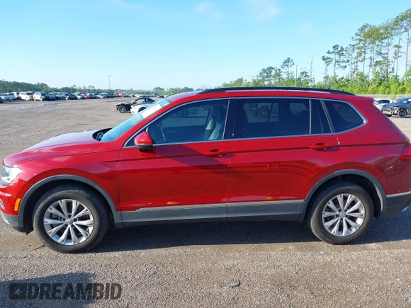 2018 Volkswagen Tiguan SEL z VIN 3VV3B7AX3JM054842, wystawiony jako IAAI lot #42240503 z przebiegiem 47 300 mil mil oraz . Historia ofert i sprzedaży dostępna na DreamBid. Obrazek 14.