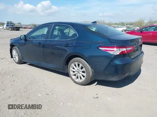 2019 Toyota Camry LE with VIN 4T1B11HK3KU254083, listed as a IAAI auction lot 42091530 with 26,635 mi miles and . Bid and sale history available at DreamBid. Image 3.