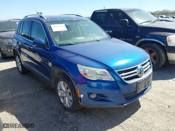 2009 Volkswagen Tiguan S with VIN WVGAV75N49W500610, listed as a IAAI auction lot 41813423 with 243,126 mi miles. Bid and sale history available at carsss.com. Image 1.