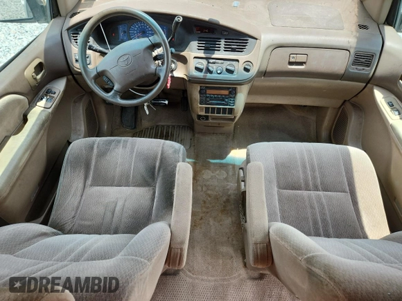 2001 Toyota Sienna CE z VIN 4T3ZF19C21U361994, wystawiony jako Copart lot #58023815 z przebiegiem 398 730 mil mil oraz Czysty tytuł • Clean title. Historia ofert i sprzedaży dostępna na DreamBid. Obrazek 8.