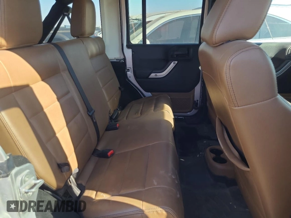 2012 Jeep Wrangler Unlimited Call of Duty MW3 с VIN 1C4BJWFG3CL103865, выставлен на аукционе Copart как лот 74237754 с пробегом 104 232 миль миль и Списание • Salvage title. История ставок и продаж доступна на DreamBid. Изображение 11.