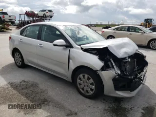 2022 Kia Rio LX with VIN 3KPA24AD2NE506127, listed as a Copart auction lot 63672404 with Not Provided miles and Salvage Title. Bid and sale history available at DreamBid. Image 4.