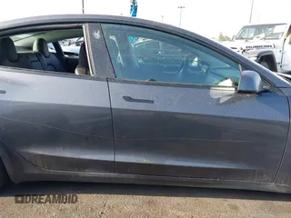 2023 Tesla Model 3 with VIN 5YJ3E1EA4PF427022, listed as a IAAI auction lot 42465964 with 169,346 mi miles and . Bid and sale history available at DreamBid. Image 13.