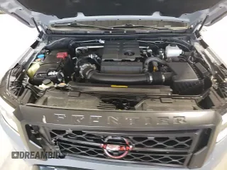 2023 Nissan Frontier SV z VIN 1N6ED1EKXPN664858, wystawiony jako Copart lot #57846615 z przebiegiem 18 584 mil mil oraz Szkoda całkowita • Salvage title. Historia ofert i sprzedaży dostępna na DreamBid. Obrazek 13.