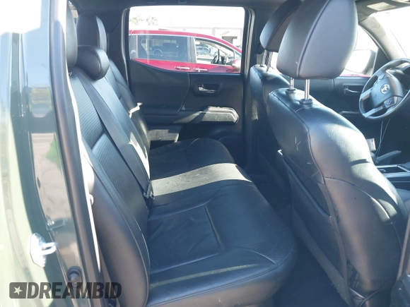 2021 Toyota Tacoma SR with VIN 3TMCZ5AN7MM395940, listed as a IAAI auction lot 41240832 with 39,338 mi miles and . Bid and sale history available at DreamBid. Image 8.