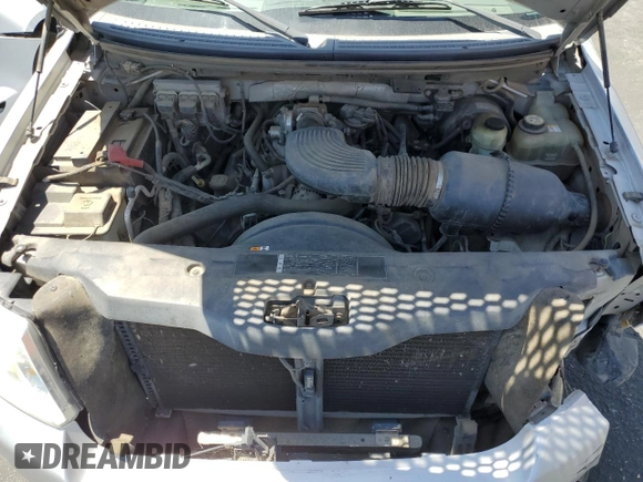 2006 Ford F-150 XLT with VIN 1FTRW12W16FA69394, listed as a Copart auction lot 59259015 with 96,303 mi miles and Salvage title. Bid and sale history available at DreamBid. Image 11.