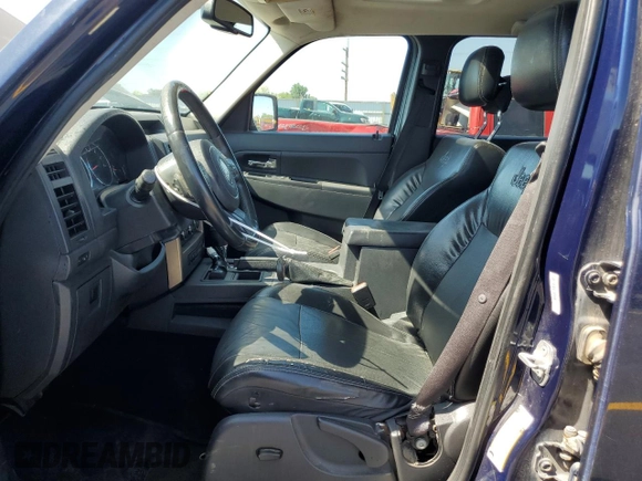 2012 Jeep Liberty Sport with VIN 1C4PJMAK5CW182377, listed as a Copart auction lot 57671345 with 140,236 mi miles and Salvage title. Bid and sale history available at DreamBid. Image 7.