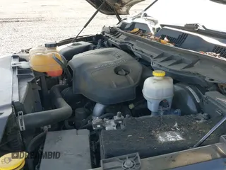 2015 Ram 1500 Laramie Longhorn с VIN 1C6RR7PM7FS548337, выставлен на аукционе IAAI как лот 40021180 с пробегом 123 684 миль миль и . История ставок и продаж доступна на DreamBid. Изображение 18.