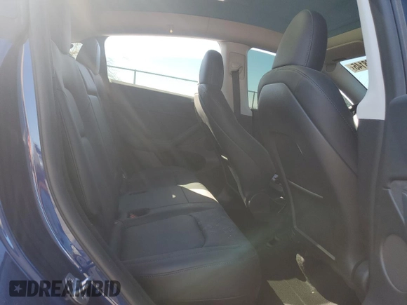 2023 Tesla Model Y Long Range z VIN 7SAYGDEE2PF908622, wystawiony jako Copart lot #47228145 z przebiegiem 10 639 mil mil oraz Szkoda całkowita • Salvage title. Historia ofert i sprzedaży dostępna na DreamBid. Obrazek 12.