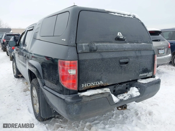 2011 Honda Ridgeline RTS with VIN 5FPYK1F48BB005889, listed as a IAAI auction lot 41268938 with 146,974 mi miles. Bid and sale history available at carsss.com. Image 3.