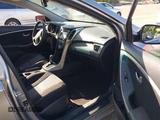 2013 Hyundai Elantra GT with VIN KMHD35LE6DU084154, listed as a IAAI auction lot 42079602 with 194,314 mi miles. Bid and sale history available at carsss.com. Image 5.
