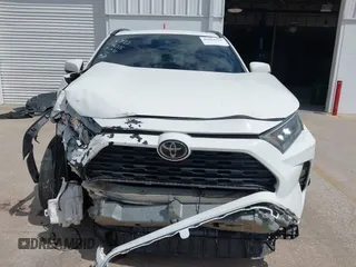 2019 Toyota RAV4 XLE with VIN 2T3W1RFVXKW033696, listed as a IAAI auction lot 42044151 with 126,872 mi miles and . Bid and sale history available at DreamBid. Image 13.