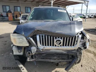 2010 Mercury Mariner with VIN 4M2CN8B75AKJ05043, listed as a Copart auction lot 42630505 with 154,741 mi miles and Salvage Title. Bid and sale history available at carsss.com. Image 5.