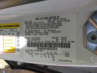 2018 Ford Fusion SE with VIN 3FA6P0H76JR227014, listed as a IAAI auction lot 41901203 with 147,454 mi miles and . Bid and sale history available at DreamBid. Image 9.