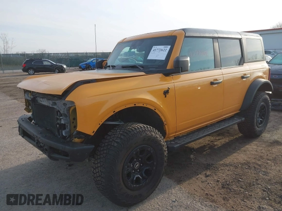2022 Ford Bronco with VIN 1FMEE5DP8NLB67834, listed as a IAAI auction lot 41772622 with 58,667 mi miles. Bid and sale history available at carsss.com. Image 2.