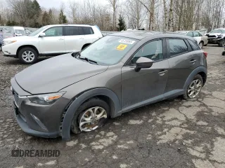 2018 Mazda CX-3 Sport z VIN JM1DKFB77J0312732, wystawiony jako Copart lot #45720065 z przebiegiem 99 866 mil mil oraz Szkoda całkowita • Salvage title. Historia ofert i sprzedaży dostępna na DreamBid. Obrazek 1.