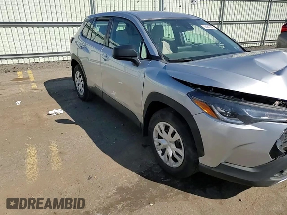 2022 Toyota Corolla Cross L with VIN 7MUAAABG0NV011057, listed as a Copart auction lot 50907545 with 59,328 mi miles and Salvage title. Bid and sale history available at DreamBid. Image 11.