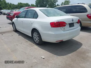 2011 Volkswagen Jetta SE with VIN 3VWDX7AJXBM348012, listed as a IAAI auction lot 42725404 with 235,361 mi miles and . Bid and sale history available at DreamBid. Image 3.