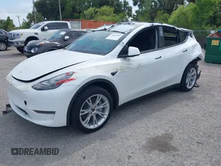 2023 Tesla Model Y Long Range with VIN 7SAYGDEE3PA206757, listed as a IAAI auction lot 39425483 with 5,711 mi miles and . Bid and sale history available at DreamBid. Image 17.