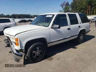 1996 GMC Yukon with VIN 1GKEK13R1TJ750705, listed as a Copart auction lot 76251474 with 245,084 mi miles and Salvage Title. Bid and sale history available at carsss.com. Image 1.
