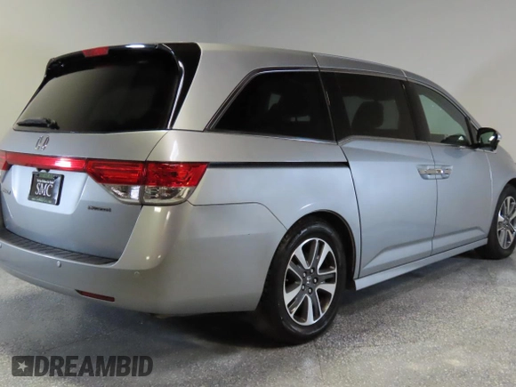 2016 Honda Odyssey Touring Elite с VIN 5FNRL5H98GB088791, выставлен на аукционе Copart как лот 59630465 с пробегом 88 100 миль миль и Списание • Salvage title. История ставок и продаж доступна на DreamBid. Изображение 3.