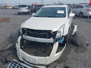 2013 Cadillac XTS with VIN 2G61N5S39D9145885, listed as a IAAI auction lot 42044388 with 181,645 mi miles and . Bid and sale history available at DreamBid. Image 6.