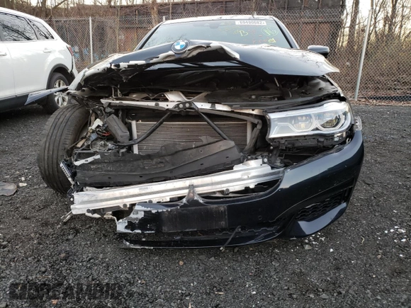 2016 BMW 7 Series 750i xDrive with VIN WBA7F2C53GG416736, listed as a Copart auction lot 69490682 with 62,148 mi miles. Bid and sale history available at carsss.com. Image 5.