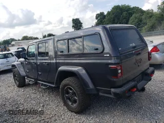 2021 Jeep Gladiator Rubicon with VIN 1C6JJTBG3ML602478, listed as a Copart auction lot 58138705 with 76,759 mi miles and Salvage title. Bid and sale history available at DreamBid. Image 2.