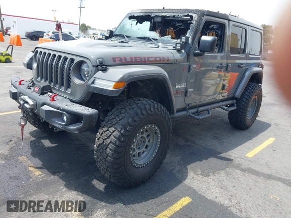 2020 Jeep Wrangler Unlimited Rubicon с VIN 1C4JJXFM4LW100382, выставлен на аукционе IAAI как лот 42338687 с пробегом Не указан миль и . История ставок и продаж доступна на DreamBid. Изображение 16.
