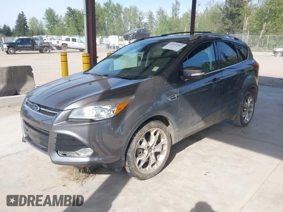 2014 Ford Escape Titanium with VIN 1FMCU9JX0EUC45801, listed as a IAAI auction lot 42121561 with 80,217 mi miles and . Bid and sale history available at DreamBid. Image 2.
