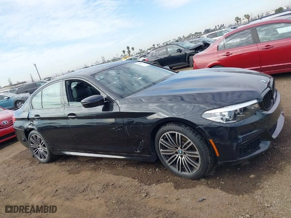 2019 BMW 5 Series 530e iPerformance with VIN WBAJA9C59KB389304, listed as a IAAI auction lot 41562928 with 64,137 mi miles. Bid and sale history available at carsss.com. Image 13.