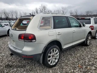 2010 Volkswagen Touareg VR6 with VIN WVGBF7A9XAD002471, listed as a Copart auction lot 83592274 with 202,497 mi miles and Salvage Title. Bid and sale history available at DreamBid. Image 3.