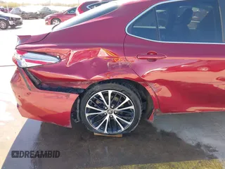 2018 Toyota Camry LE z VIN 4T1B11HK9JU583160, wystawiony jako IAAI lot #41707215 z przebiegiem 134 214 mil mil oraz . Historia ofert i sprzedaży dostępna na DreamBid. Obrazek 18.