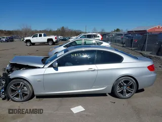 2013 BMW 3 Series 335i xDrive with VIN WBAKF9C56DE860199, listed as a IAAI auction lot 41823376 with Not provided miles and . Bid and sale history available at DreamBid. Image 14.