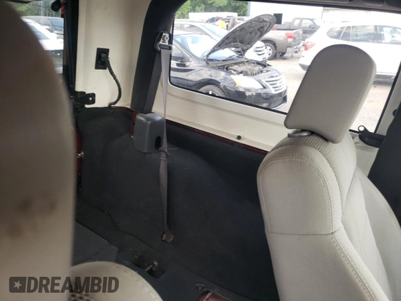 2007 Jeep Wrangler Sahara с VIN 1J4FA54137L205242, выставлен на аукционе Copart как лот 65080025 с пробегом 128 682 миль миль и Списание • Salvage title. История ставок и продаж доступна на DreamBid. Изображение 10.