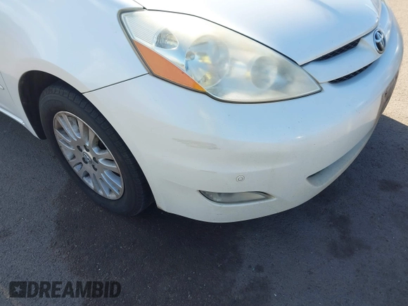 2010 Toyota Sienna XLE with VIN 5TDYK4CC3AS336590, listed as a IAAI auction lot 41798194 with 230,707 mi miles. Bid and sale history available at carsss.com. Image 6.